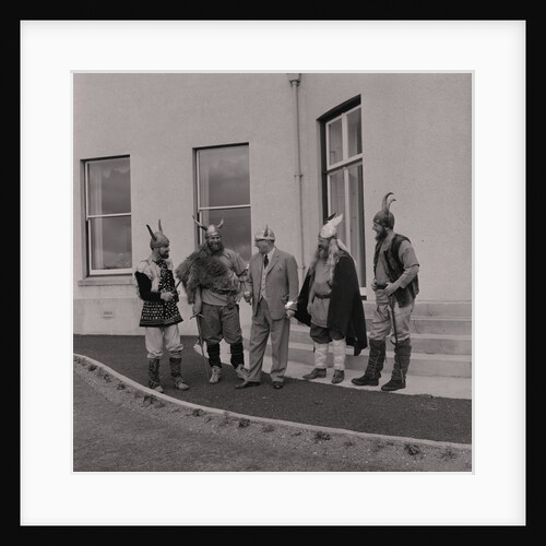 Lieutenant Governor Sir Ronald Herbert Garvey given a Viking helmet by Manx Press Pictures