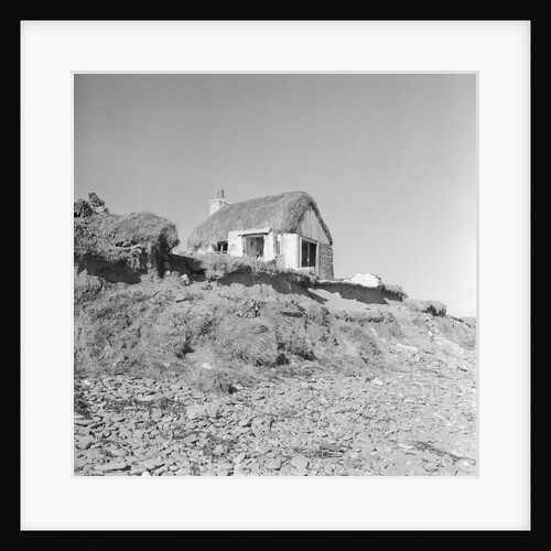 Thatched cottage and coastal erosion, Bride by Manx Press Pictures
