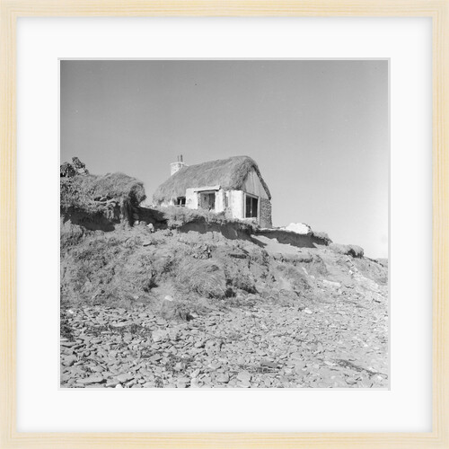 Thatched cottage and coastal erosion, Bride by Manx Press Pictures