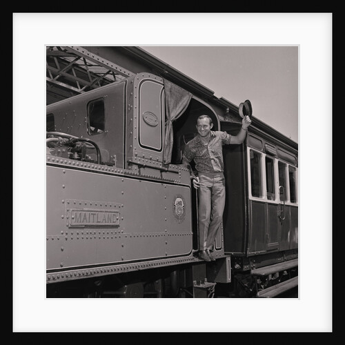 Mike Hailwood on steam train by Manx Press Pictures