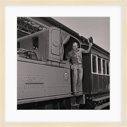 Mike Hailwood on steam train by Manx Press Pictures