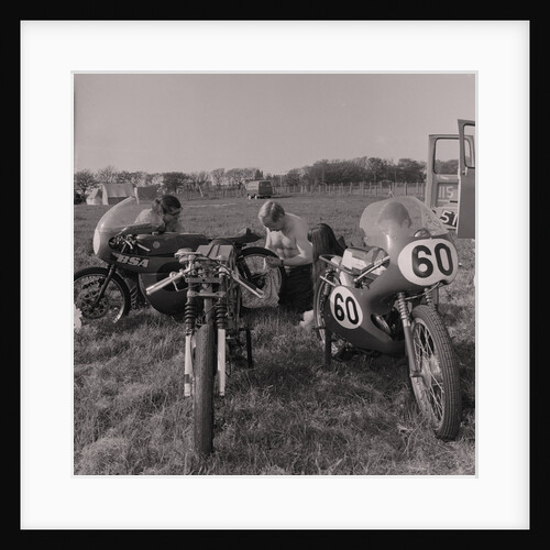 TT riders behind The Grandstand by Manx Press Pictures