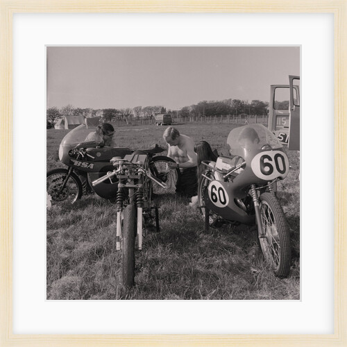 TT riders behind The Grandstand by Manx Press Pictures