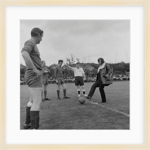 George Best kicking-off charity football match by Manx Press Pictures