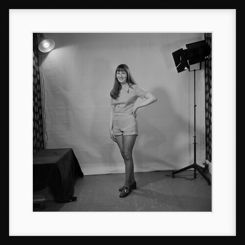 Woman in hot pants in studio, Isle of Man by Manx Press Pictures