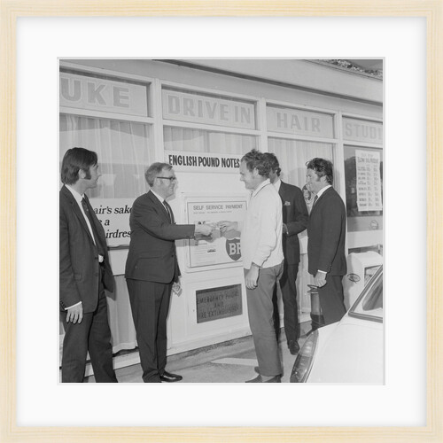 Geoff Duke at petrol station auto pay kiosk by Manx Press Pictures