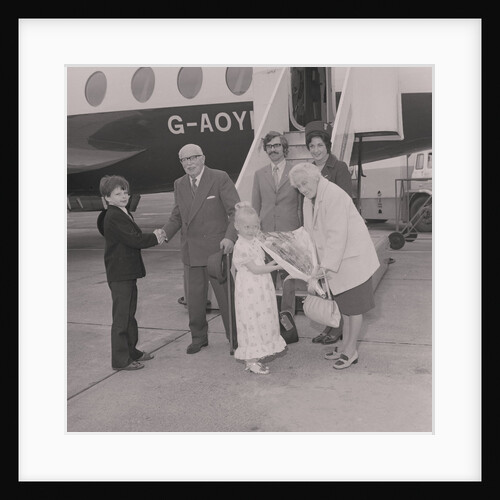 Visitors to the Isle of Man for 70 years arrive at Ronaldsway Airport by Manx Press Pictures