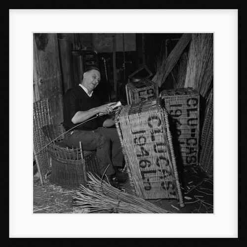 Blind basket weaver at Clucas' by Manx Press Pictures