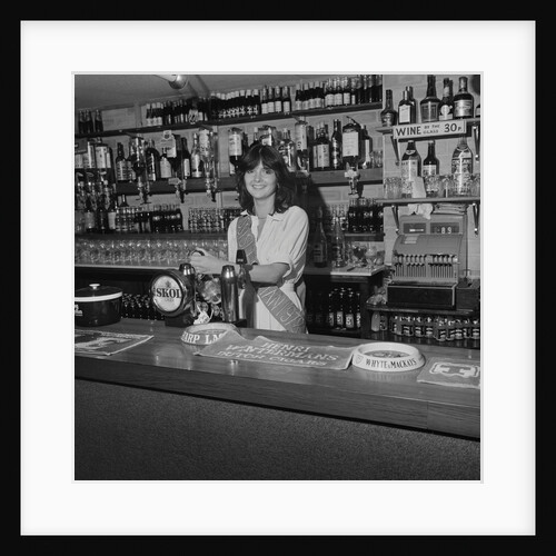 Miss Isle of Man behind the bar by Manx Press Pictures