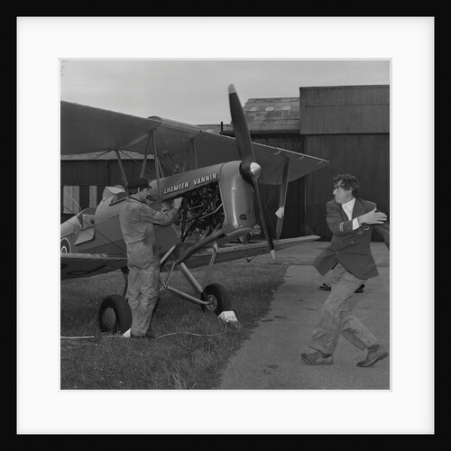 Tiger Moth plane at airport by Manx Press Pictures
