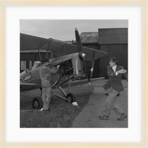 Tiger Moth plane at airport by Manx Press Pictures