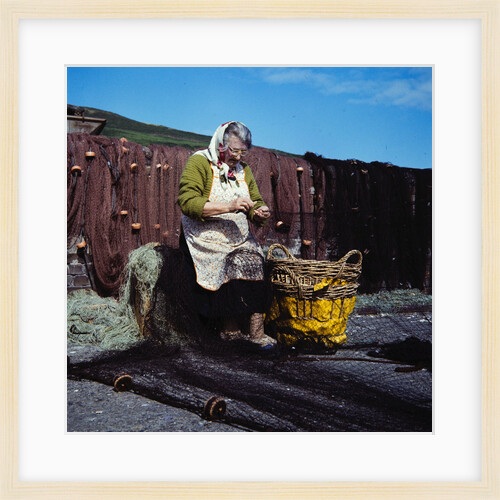 Mending the nets by Manx Press Pictures