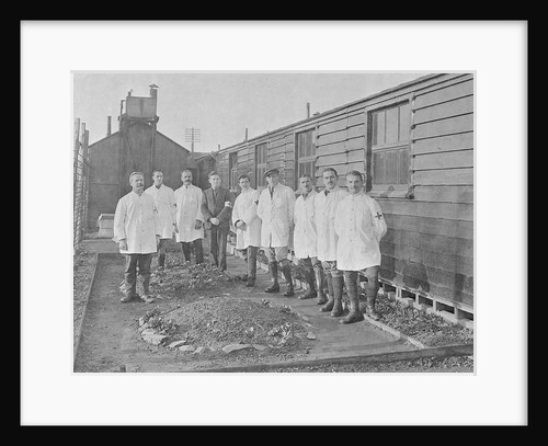 First World War Internee in front of hut with medical/hospital staff, Camp 2, Knockaloe by W H Warburton