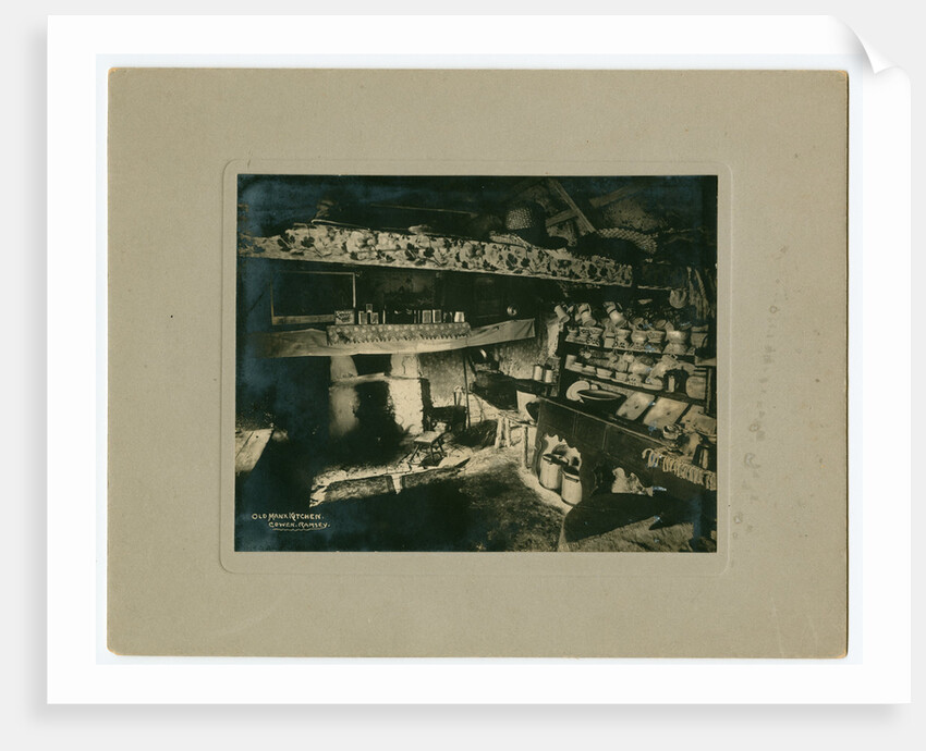 Kitchen interior of a thatched cottage in Andreas by George Bellett Cowen