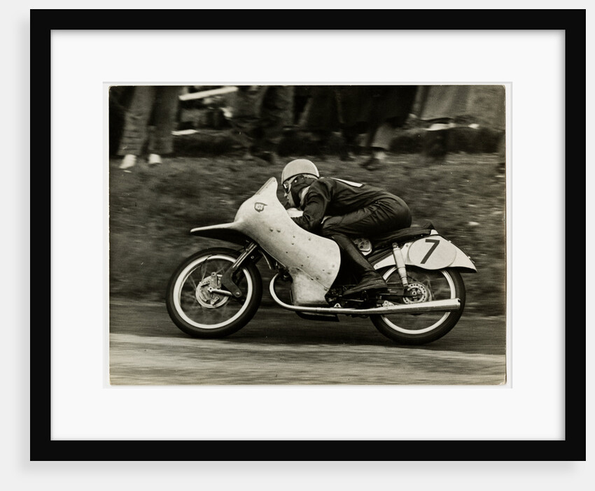 Werner Haas, riding NSU (number 7) 1954 TT (Tourist Trophy) by T.M. Badger