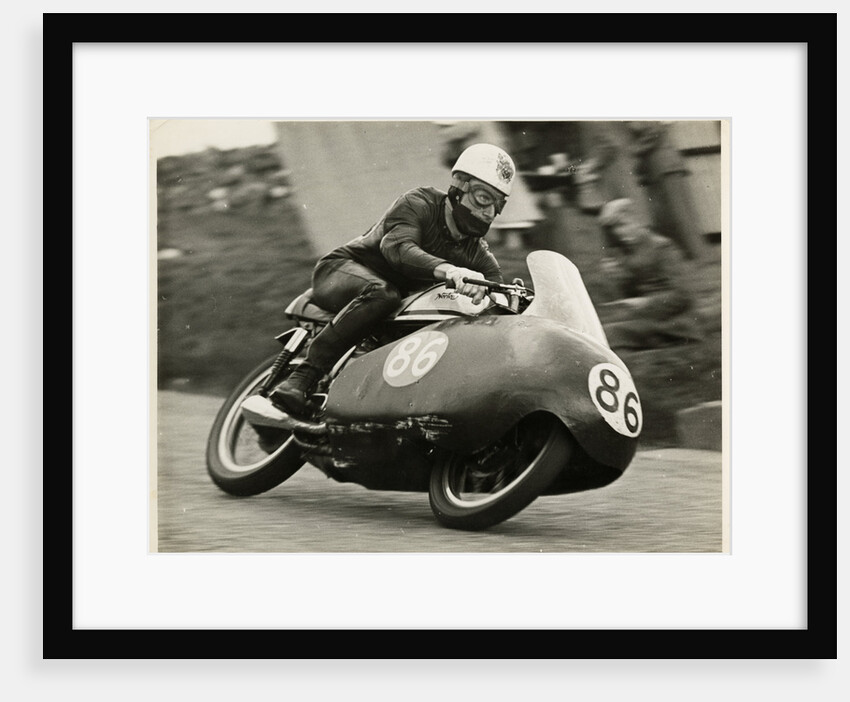 John Hartle, riding a Norton (number 86), 1957 Junior TT (Tourist Trophy) by T.M. Badger