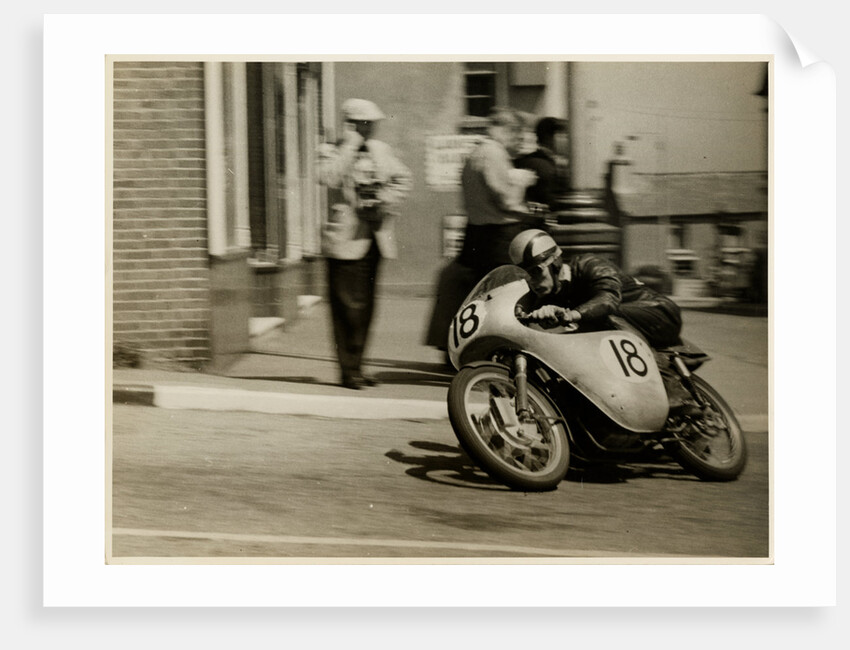 Fron Purslow, aboard 124cc Ducati (number 18), 1958 125 TT (Tourist Trophy) by T.M. Badger