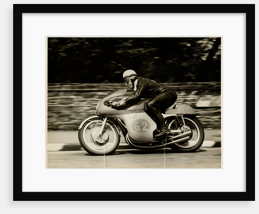 John Surtees, riding as number 62, 1958 Junior TT (Tourist Trophy) by T.M. Badger