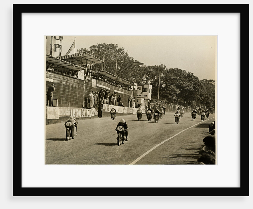 Competitors leaving the start line during the mass start of the 1958 250cc TT (Tourist Trophy) by T.M. Badger