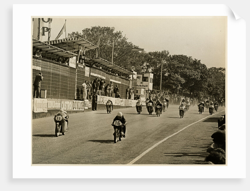 Competitors leaving the start line during the mass start of the 1958 250cc TT (Tourist Trophy) by T.M. Badger