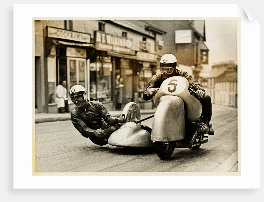BMW sidecar outfit (number 5) passing through Onchan village by T.M. Badger