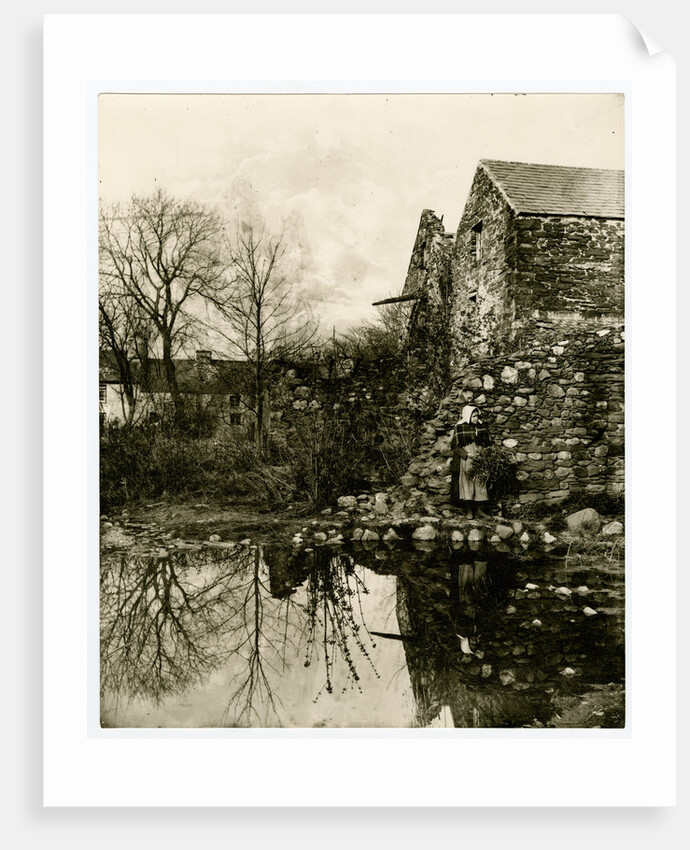Study of woman gathering wood alongside a stream by George Bellett Cowen