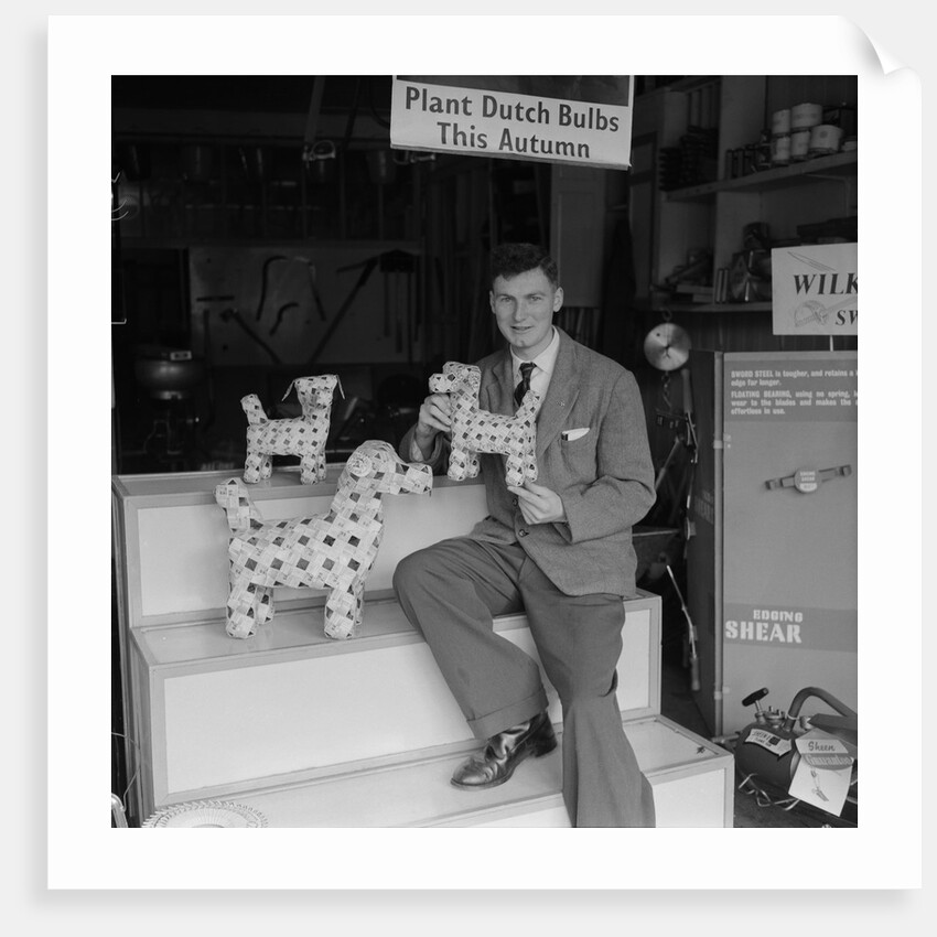 'Chap with Cigarette Packet Dogs' by Manx Press Pictures