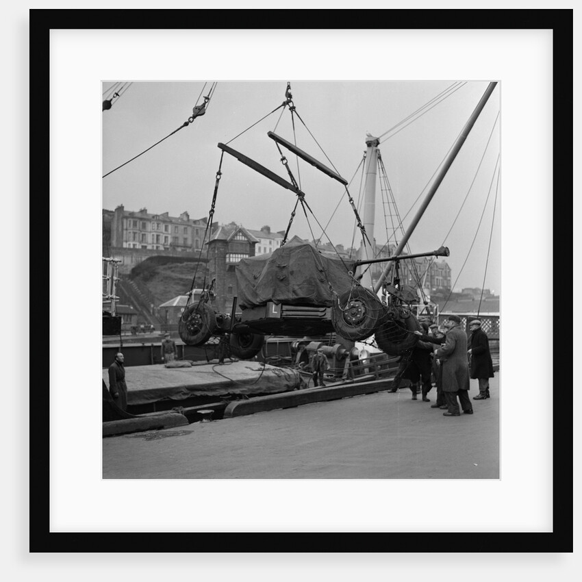 Unloading ack-ack guns for Territorial Army, Douglas Harbour by Manx Press Pictures