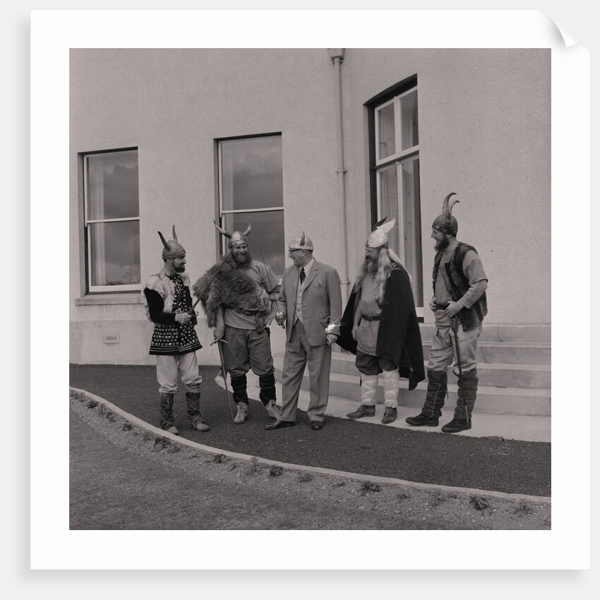 Lieutenant Governor Sir Ronald Herbert Garvey given a Viking helmet by Manx Press Pictures