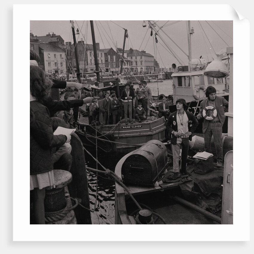 Radio Caroline disc jockeys Tony Prince and Dave Lee Travis on boat, East Quay, Ramsey Harbour by Manx Press Pictures