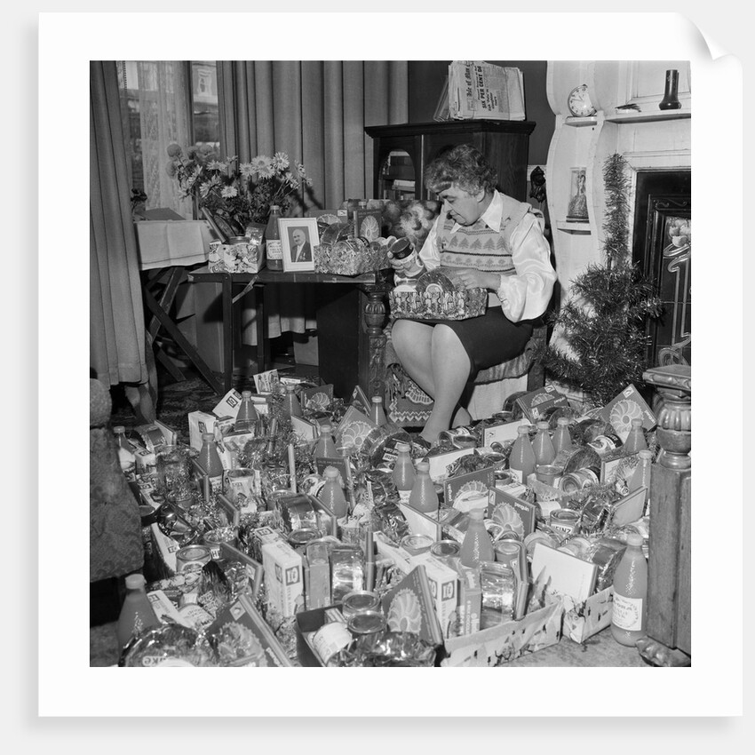 Woman with Christmas hampers, Isle of Man by Manx Press Pictures