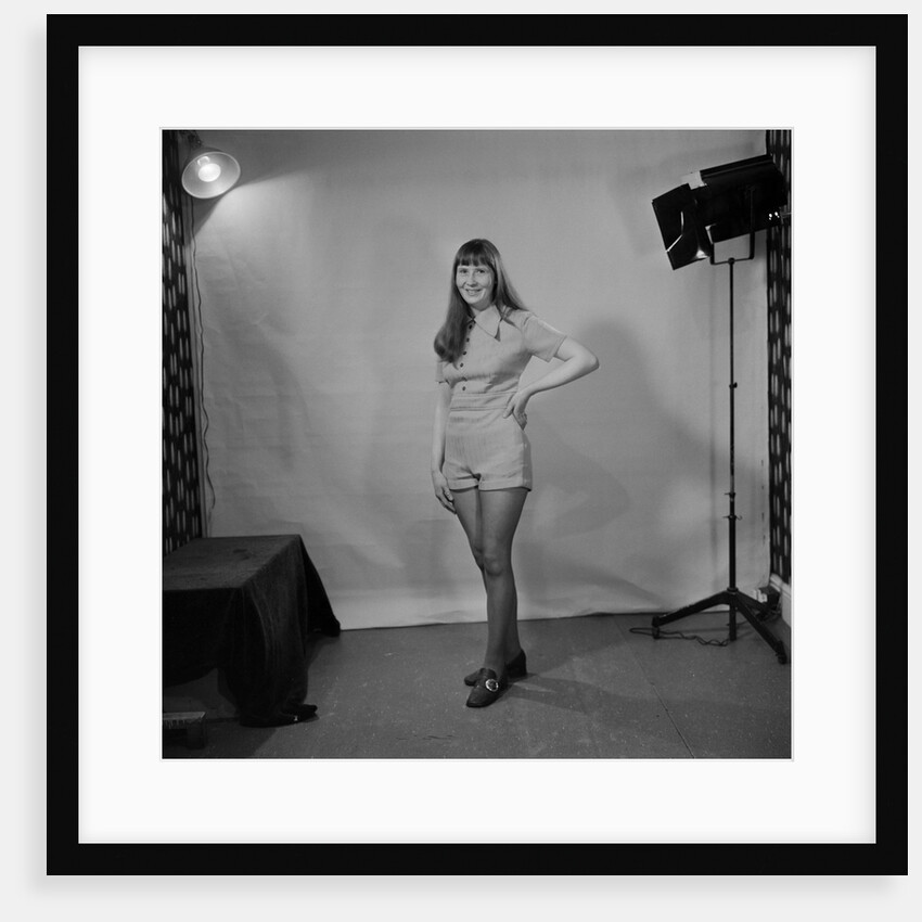 Woman in hot pants in studio, Isle of Man by Manx Press Pictures