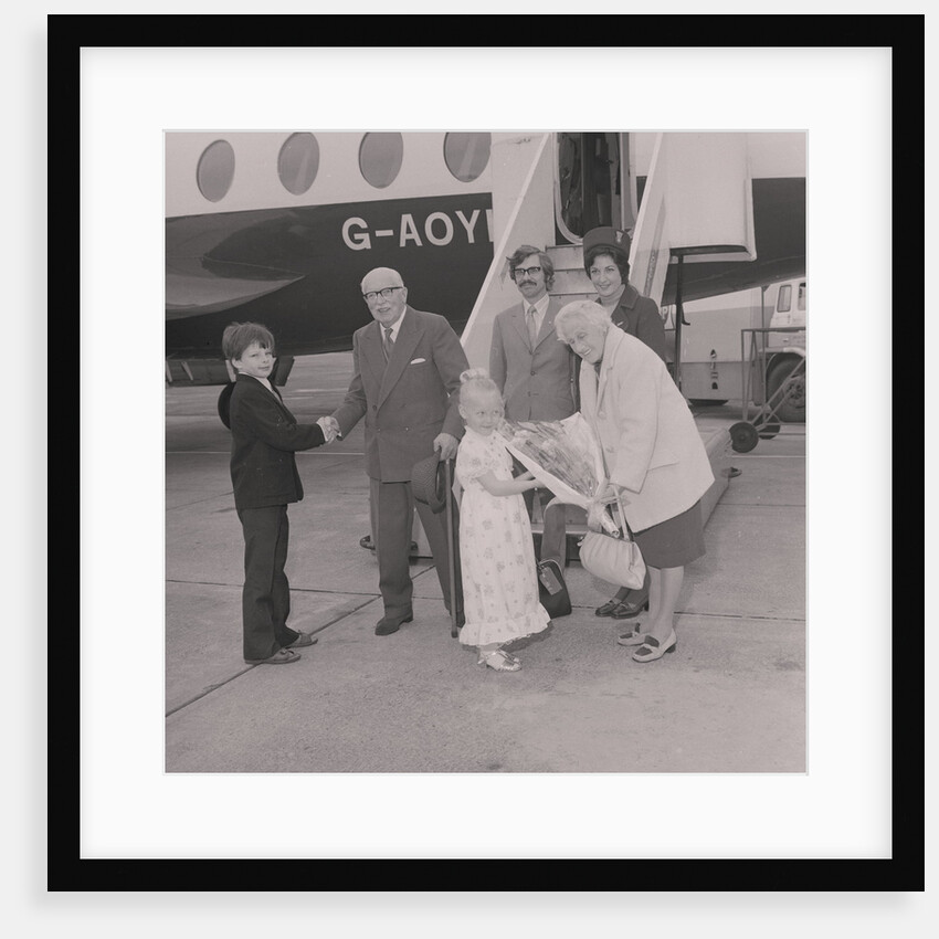 Visitors to the Isle of Man for 70 years arrive at Ronaldsway Airport by Manx Press Pictures