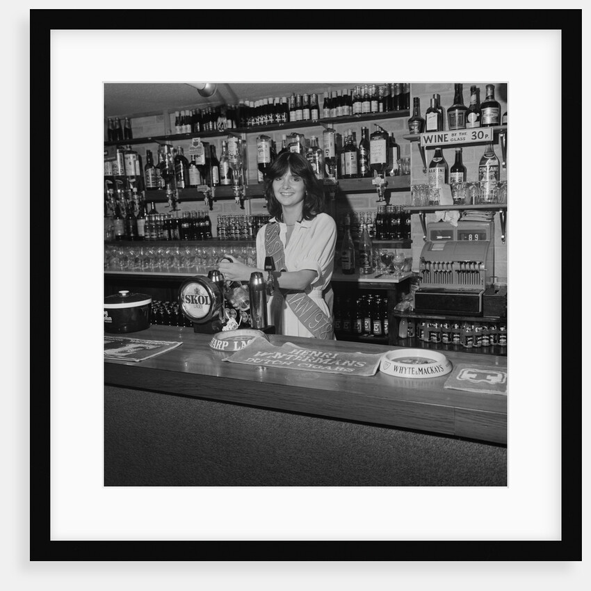 Miss Isle of Man behind the bar by Manx Press Pictures