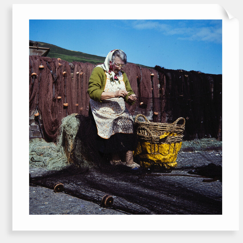 Mending the nets by Manx Press Pictures