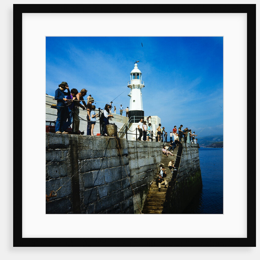 Fishing on the breakwater, Peel by Manx Press Pictures