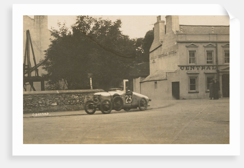 Motorcar no.23 G. Bedford in a Hillman at Parliament Square turning off Lezayre Road, Ramsey, 1922 Tourist Trophy motorcar race by Anonymous