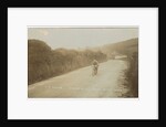 Rider passing along Kirk Michael to Peel coast road, captioned ‘C.R.Collier, winner of the motorcycle race’, likely to be 1907 TT (Tourist Trophy) by Anonymous