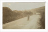 Rider passing along Kirk Michael to Peel coast road, captioned ‘C.R.Collier, winner of the motorcycle race’, likely to be 1907 TT (Tourist Trophy) by Anonymous