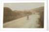 Rider passing along Kirk Michael to Peel coast road, captioned ‘C.R.Collier, winner of the motorcycle race’, likely to be 1907 TT (Tourist Trophy) by Anonymous