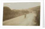 Rider passing along Kirk Michael to Peel coast road, captioned ‘C.R.Collier, winner of the motorcycle race’, likely to be 1907 TT (Tourist Trophy) by Anonymous