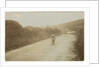 Rider passing along Kirk Michael to Peel coast road, captioned ‘C.R.Collier, winner of the motorcycle race’, likely to be 1907 TT (Tourist Trophy) by Anonymous