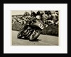 John Surtees riding as number 81 at Kate's Cottage, 1956 Senior TT (Tourist Trophy) by T.M. Badger