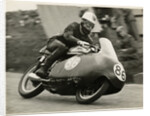 John Hartle, riding a Norton (number 86), 1957 Junior TT (Tourist Trophy) by T.M. Badger