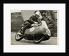 John Hartle, riding a Norton (number 86), 1957 Junior TT (Tourist Trophy) by T.M. Badger