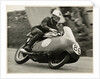 John Hartle, riding a Norton (number 86), 1957 Junior TT (Tourist Trophy) by T.M. Badger
