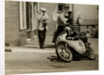 Fron Purslow, aboard 124cc Ducati (number 18), 1958 125 TT (Tourist Trophy) by T.M. Badger