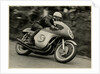 John Surtees, riding MV Agusta (number 65), 1958 Senior TT (Tourist Trophy) by T.M. Badger