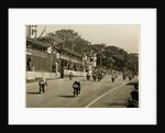 Competitors leaving the start line during the mass start of the 1958 250cc TT (Tourist Trophy) by T.M. Badger