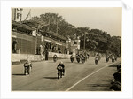Competitors leaving the start line during the mass start of the 1958 250cc TT (Tourist Trophy) by T.M. Badger